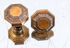 matching set of original ornamental cast bronze holabird and root-designed palmolive building lobby doorknobs