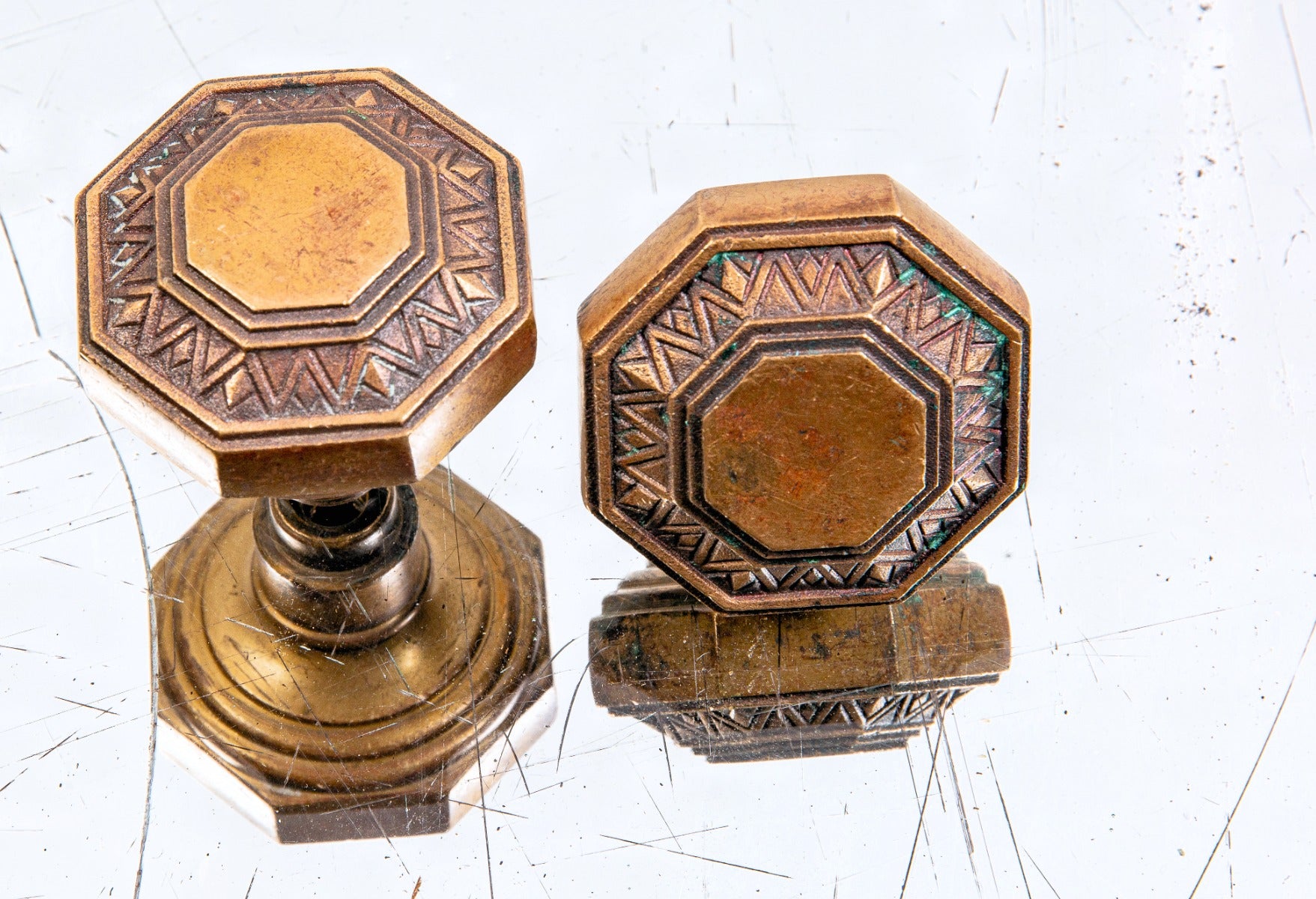 matching set of original ornamental cast bronze holabird and root-designed palmolive building lobby doorknobs