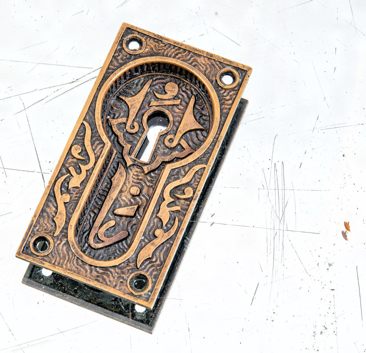 highly sought after 19th century "arabic" pattern ornamental cast bronze interior residential pocket door backplate by mallory wheeler