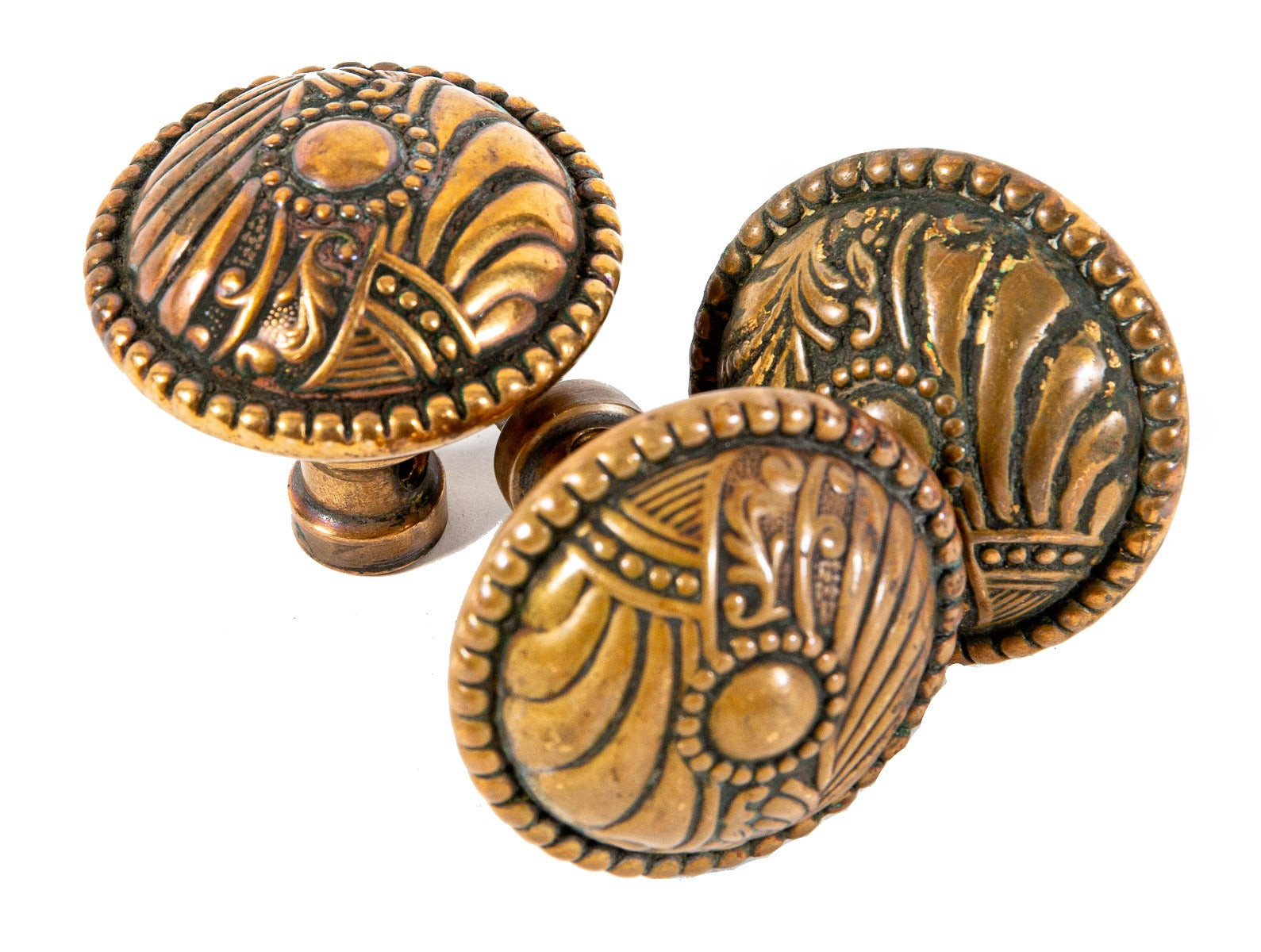 group of three matching wrought bronze early 20th century antique american residential "roanoke" pattern doorknobs