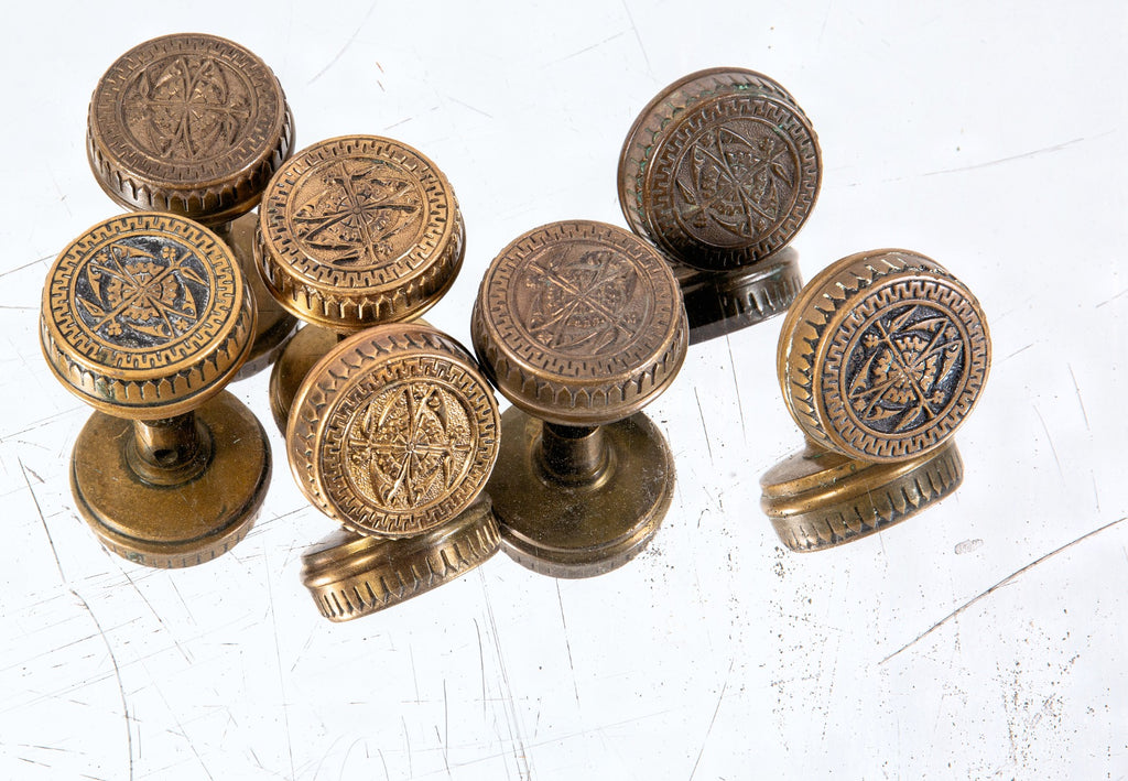 seven original 19th century salvaged chicago eastlake style drum-shaped cast bronze doorknobs