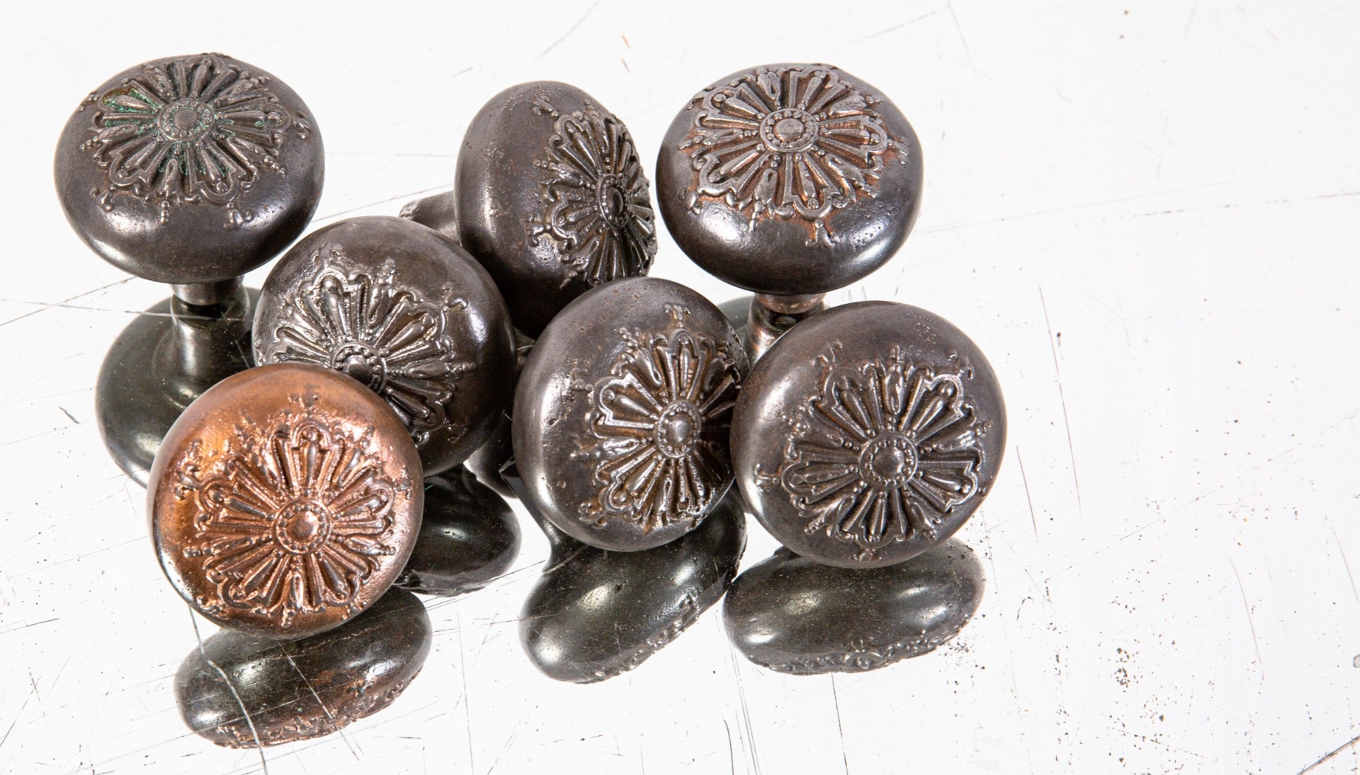 lot of matching early 20th century ornamental cast iron "ontario" pattern salvaged chicago passage doorknobs