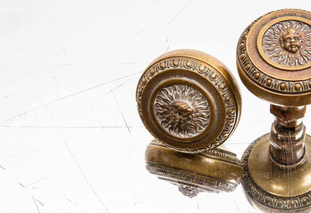one of two matching custom-designed early 20th century cast bronze land, title and trust building doorknobs designed by d.h. burnham and company