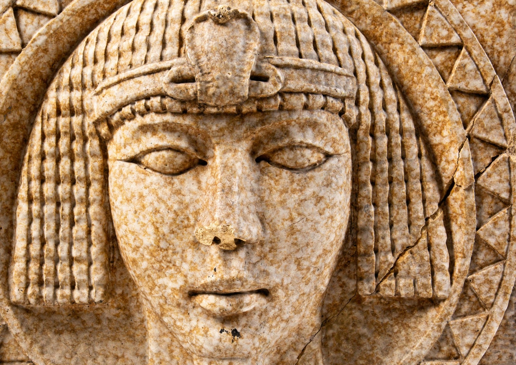 original 1928 exterior egyptian-revival style mottled finish terra cotta pharaoh head salvaged from knights of pythias building