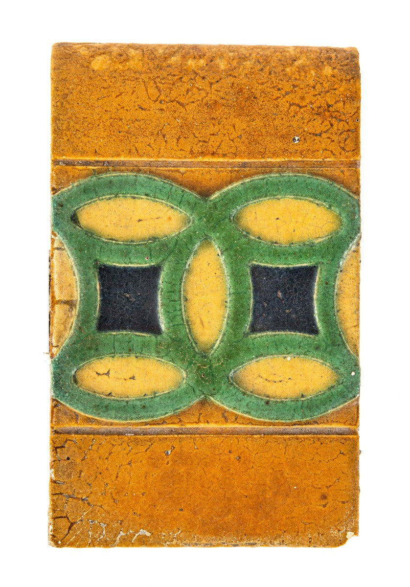 original claude bragdon-designed strongly geometric new york central station grueby tile with richly colored glaze