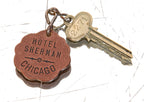 original early 20th century antique guest room fob and key from chicago's hotel sherman