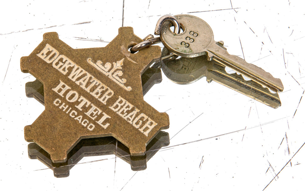 authentic late 1920's historic edgewater beach hotel guest room fob with yake and towne door key