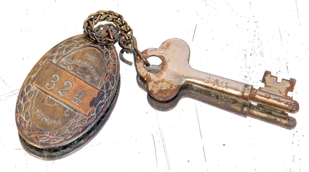 early 20th century original salvaged chicago blackstone hotel ornamental cast bronze guest room key fob with nickel-plated skeleton key