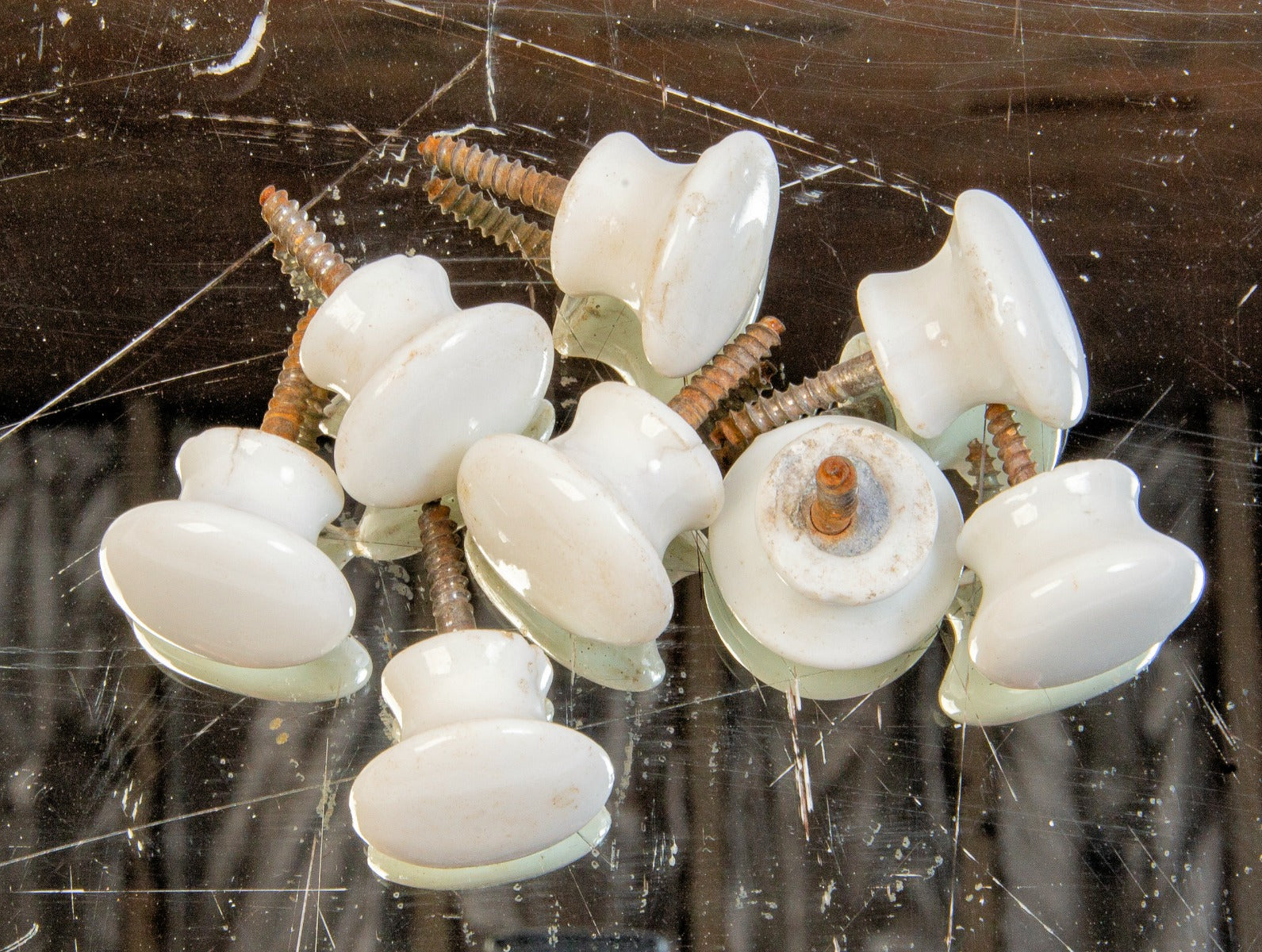 matching 1870s original diminutive white porcelain cabinet drawer pulls with threaded screws