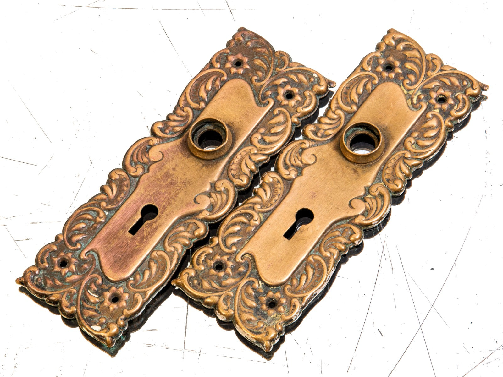 matching set of early 20th century antique american ornamental wrought bronze "eulalia" pattern doorknob backplates