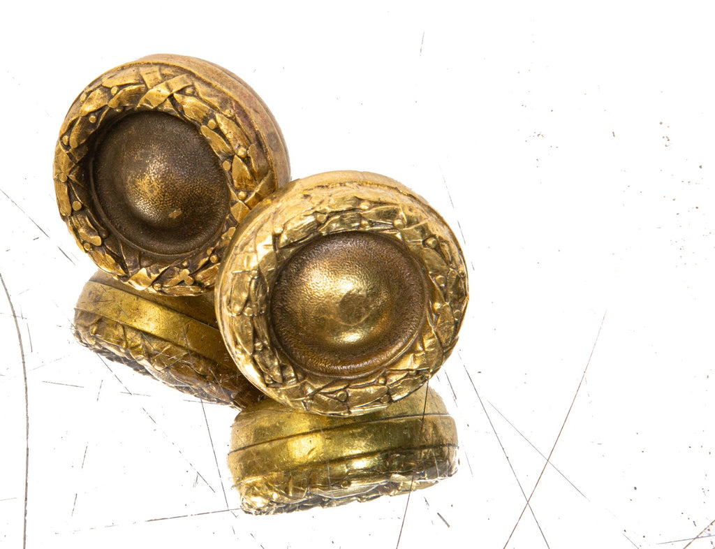 matchign set or original neoclassical style cast brass doorknobs from holabird and roche's chicago city hall