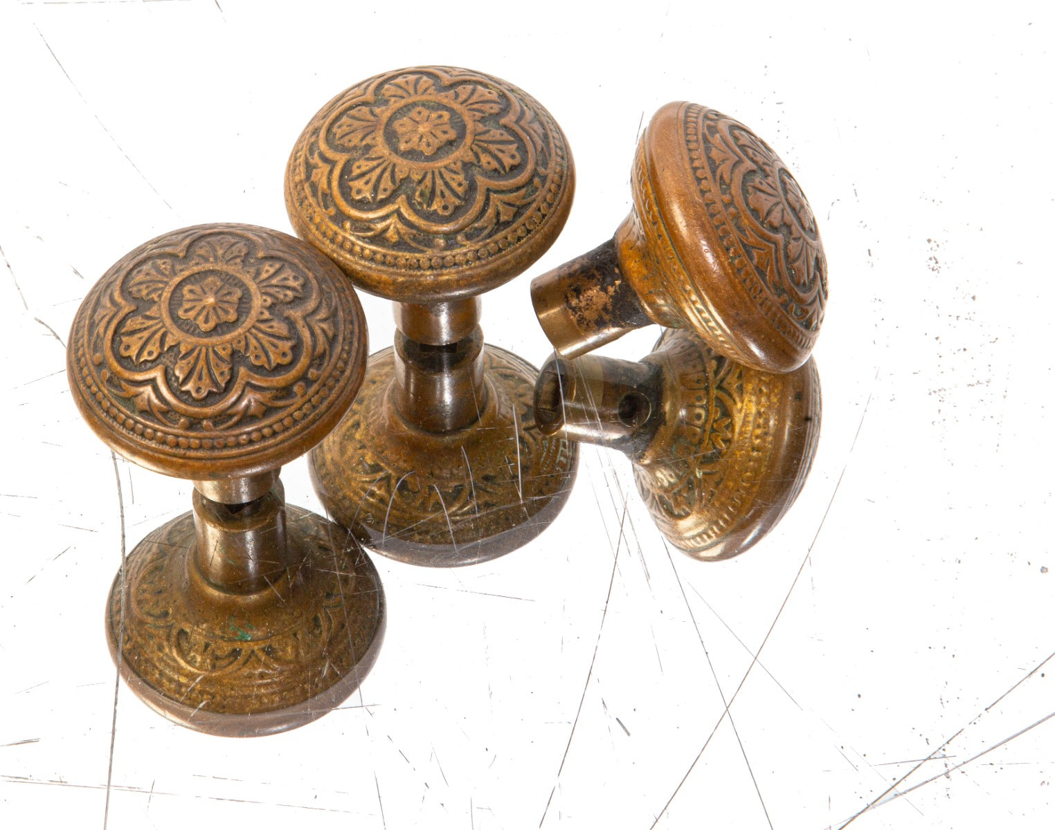 group of three matching 19th century ornamental cast brass p.f. corbin victorian style passage doorknobs