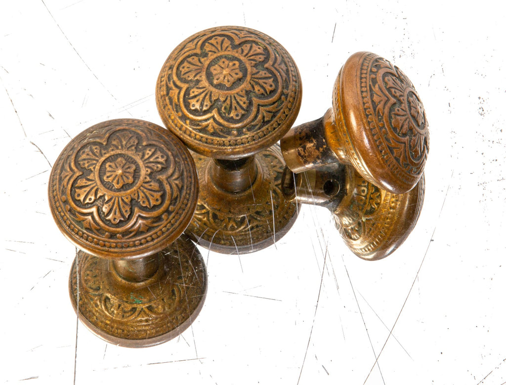 group of three matching 19th century ornamental cast brass p.f. corbin victorian style passage doorknobs
