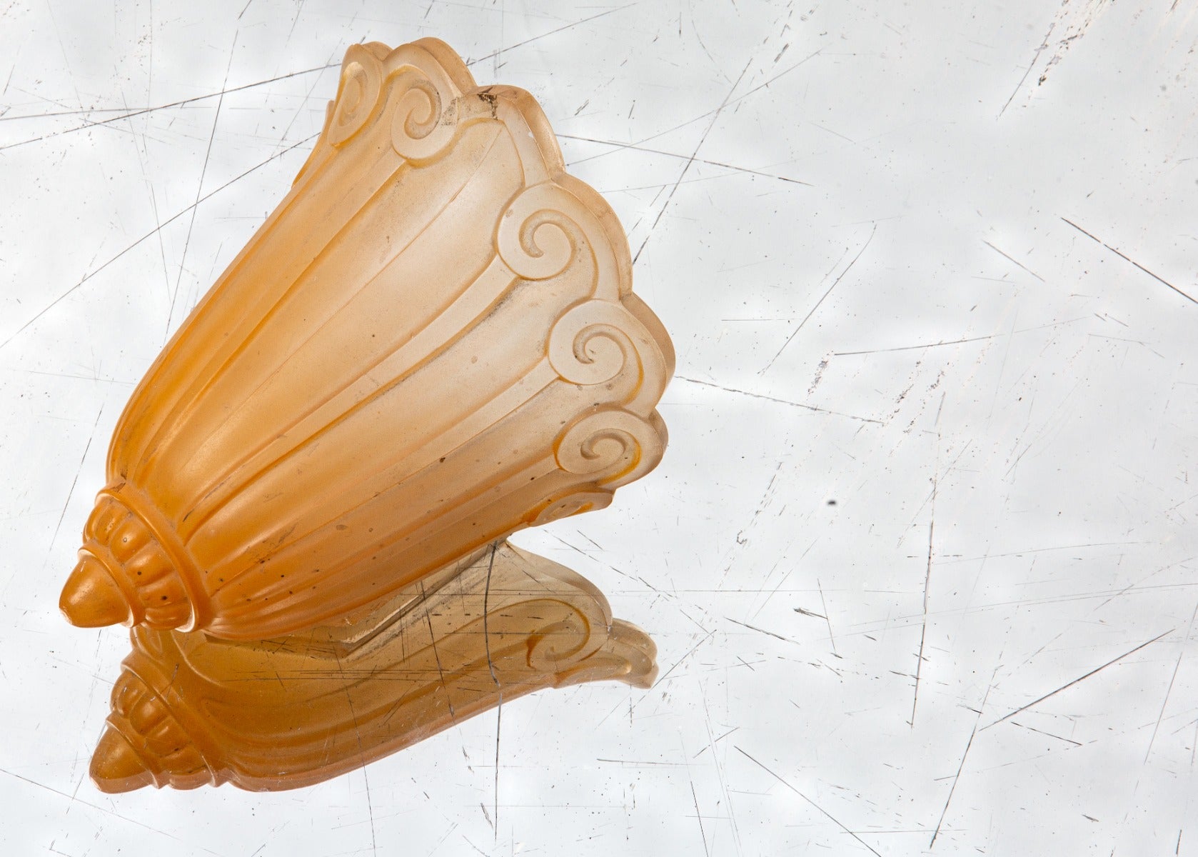 Original depression era two-tone baked-on enameled pressed glass ceiling fixture replacement slip shade listed as apart of the "fleur-de-lis" lighting series