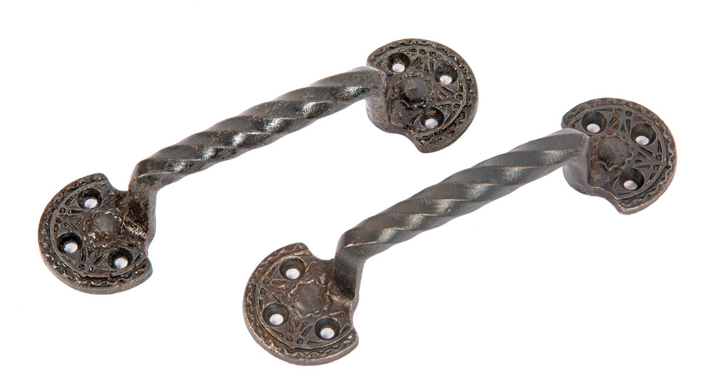 matching set of louis h. sullivan-designed ornamental cast iron chicago stock exchange window sash pulls