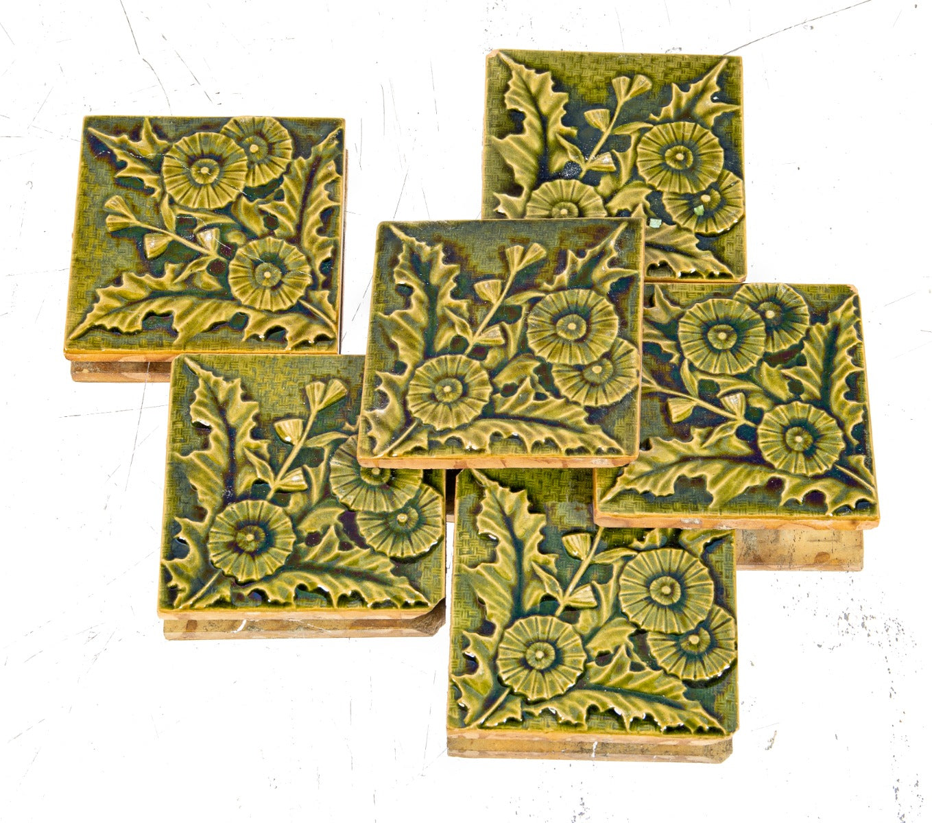 richly colored mottled green majolica glazed "thistle" or "holly" pattern salvaged chicago fireplace tiles