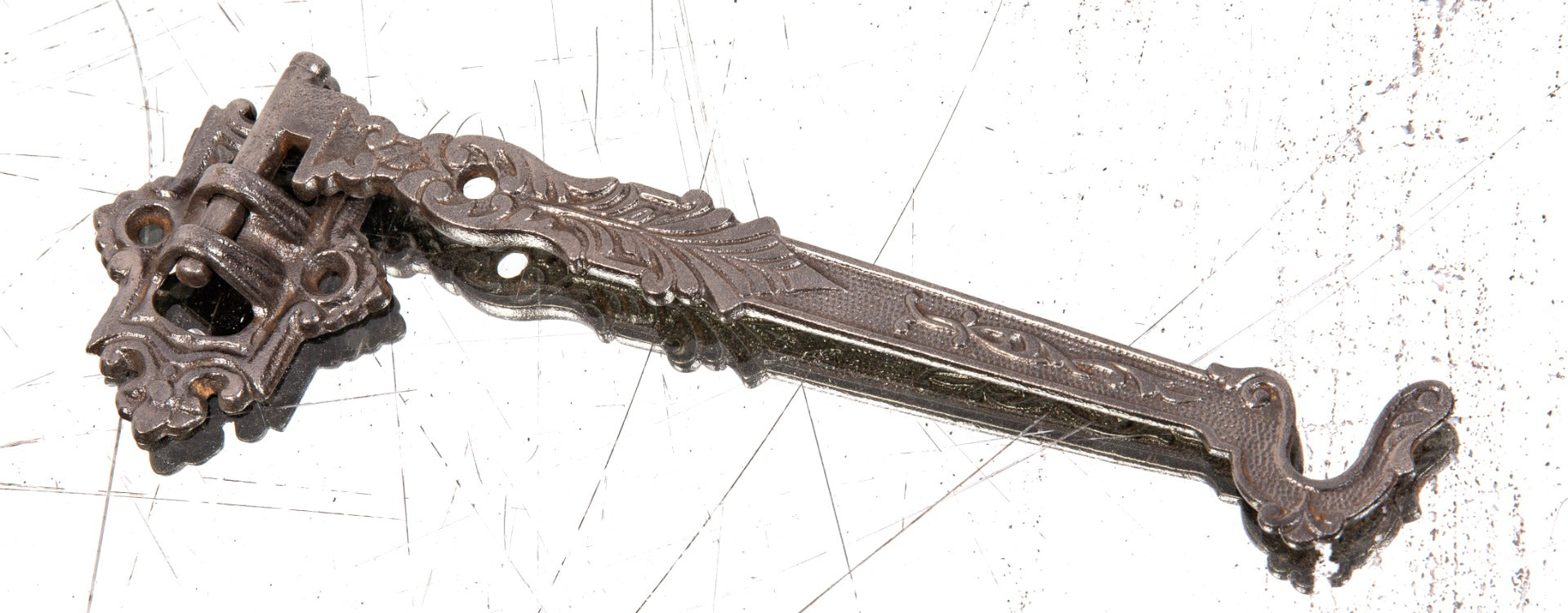 unusual antique american 19th century oversized wall-mount oversized ornamental cast iron pivoting hook