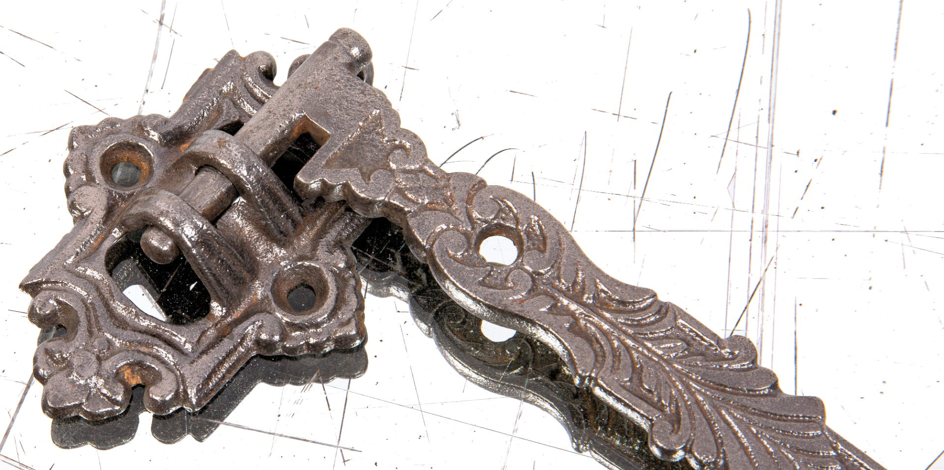 unusual antique american 19th century oversized wall-mount oversized ornamental cast iron pivoting hook