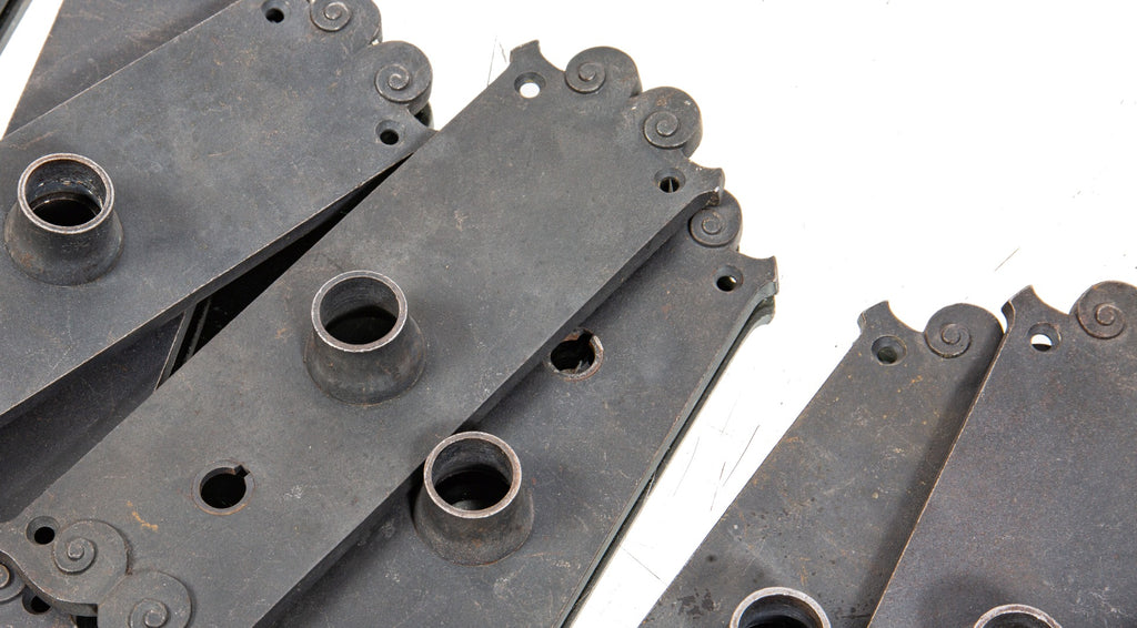 ten matching original 1890s interior reliance building office cast iron doorknob backplates with original bower-barff finish