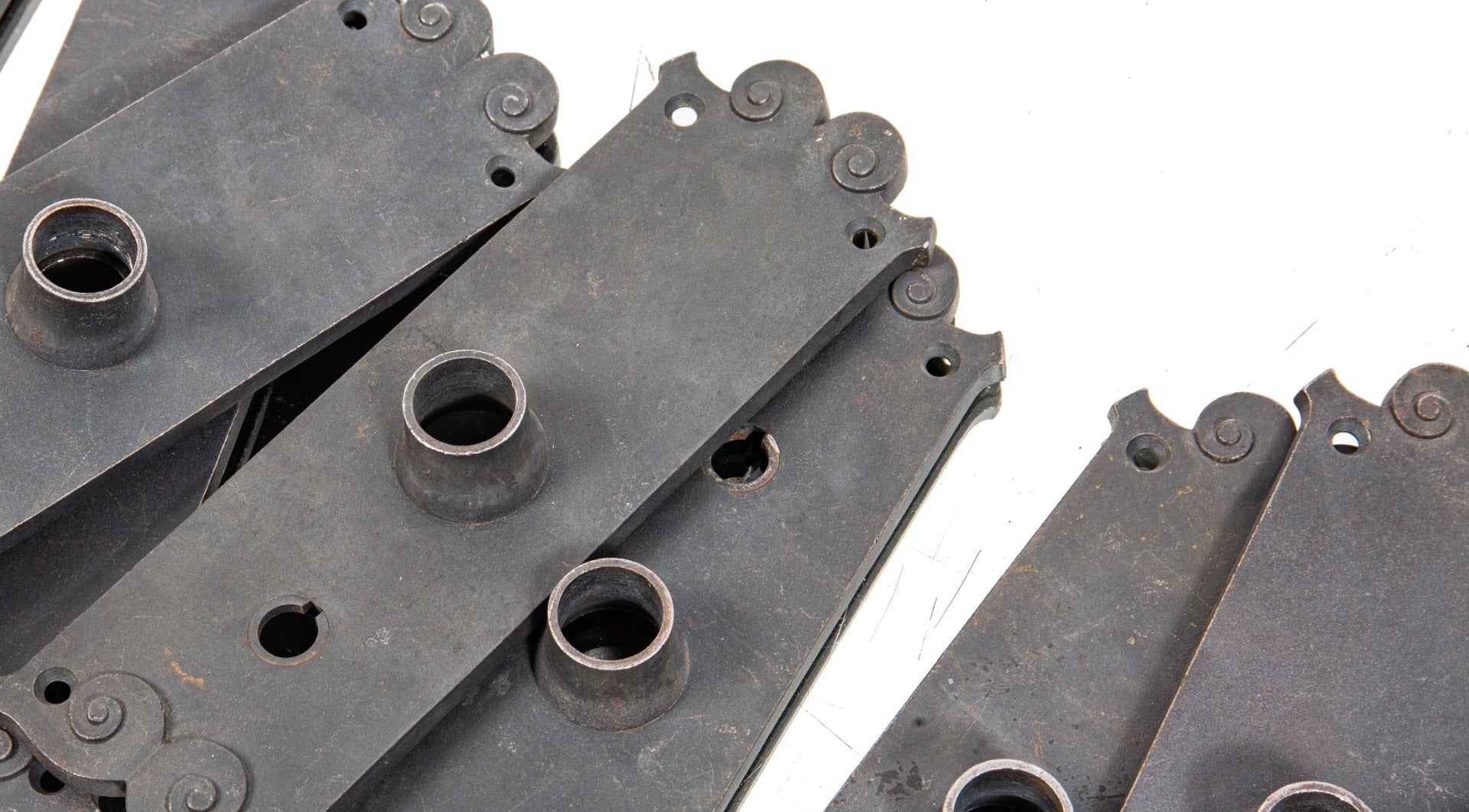 ten matching original 1890s interior reliance building office cast iron doorknob backplates with original bower-barff finish