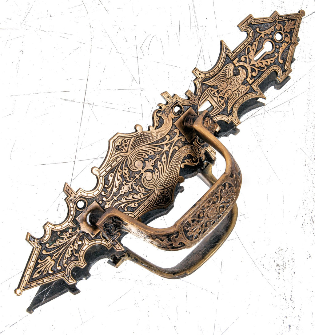 19th century 1870s high victorian-era ornamental cast brass oversized commercial door thumblatch with griffins