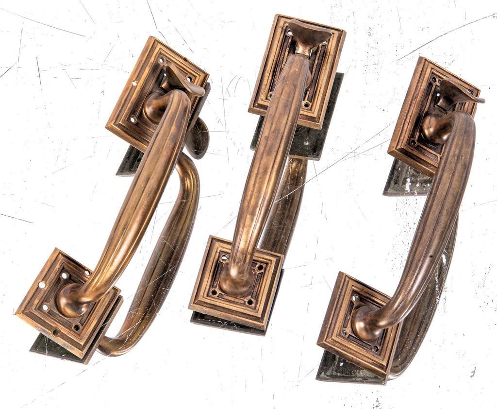 three matching early 20th century cast bronze exterior chicago bank building thumblatch entrance door handles
