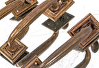 three matching early 20th century cast bronze exterior chicago bank building thumblatch entrance door handles