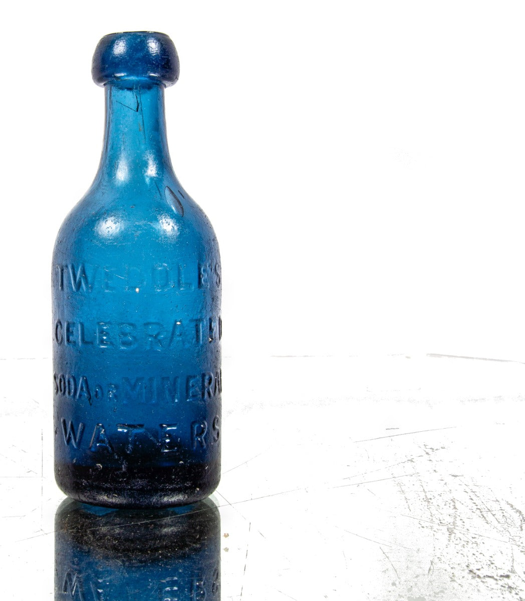 hard to find mid-1840's cobalt blue iron pontiled soda bottle with blobtop manufactured for new york bottler john tweddle jr.