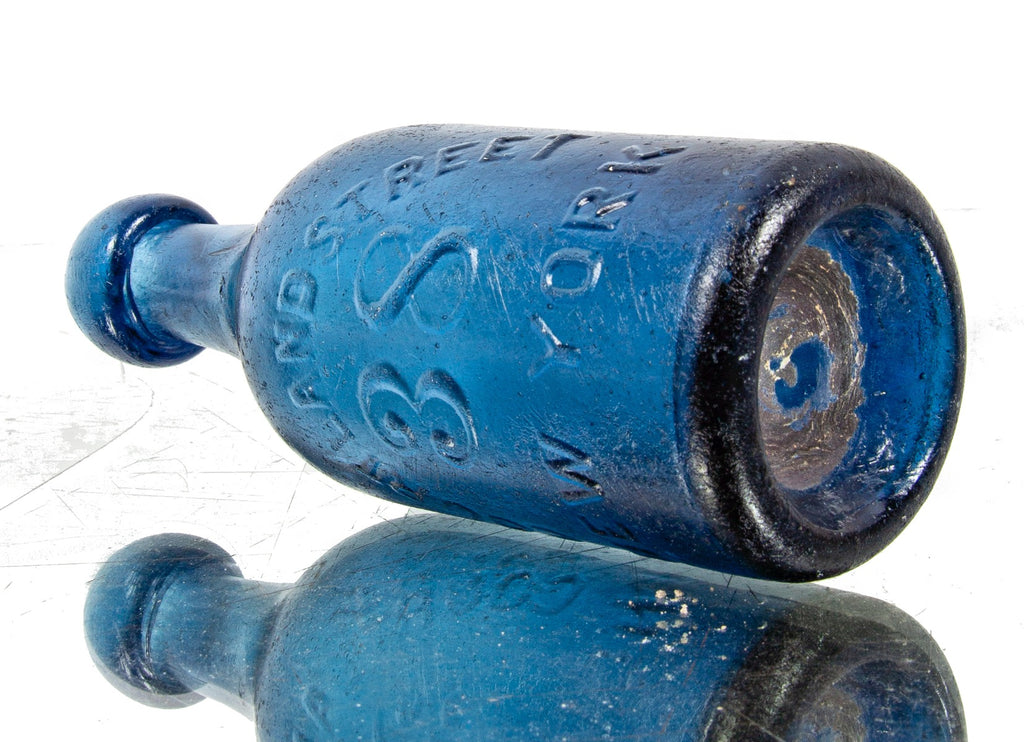 hard to find mid-1840's cobalt blue iron pontiled soda bottle with blobtop manufactured for new york bottler john tweddle jr.