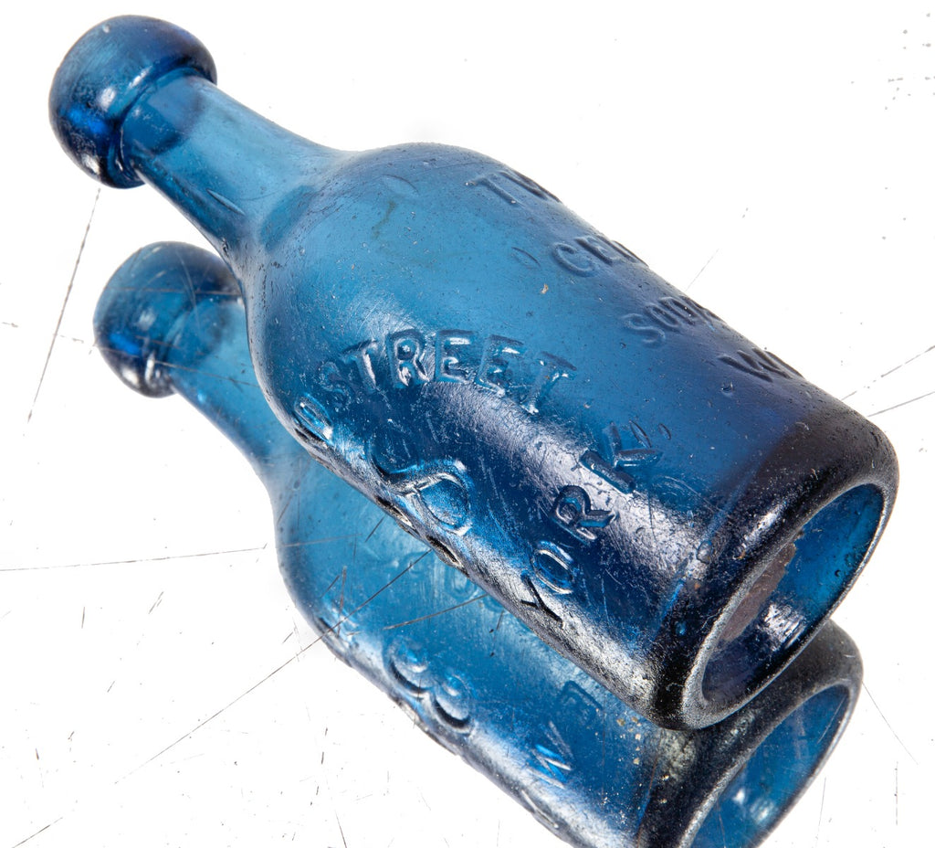 hard to find mid-1840's cobalt blue iron pontiled soda bottle with blobtop manufactured for new york bottler john tweddle jr.