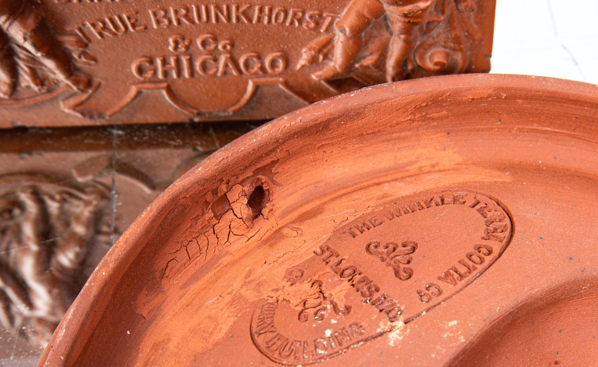 original red slip-glazed american victorian-era winkle terra cotta figural rondel salesman sample