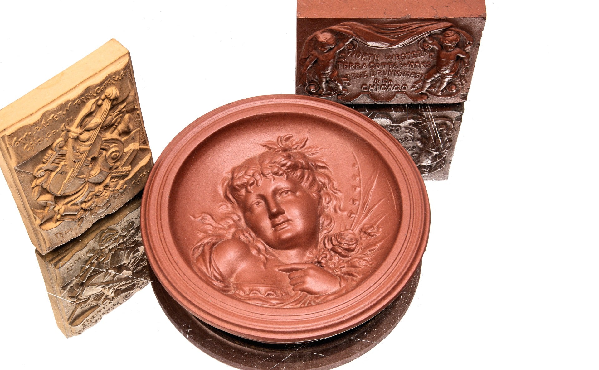 original red slip-glazed american victorian-era winkle terra cotta figural rondel salesman sample