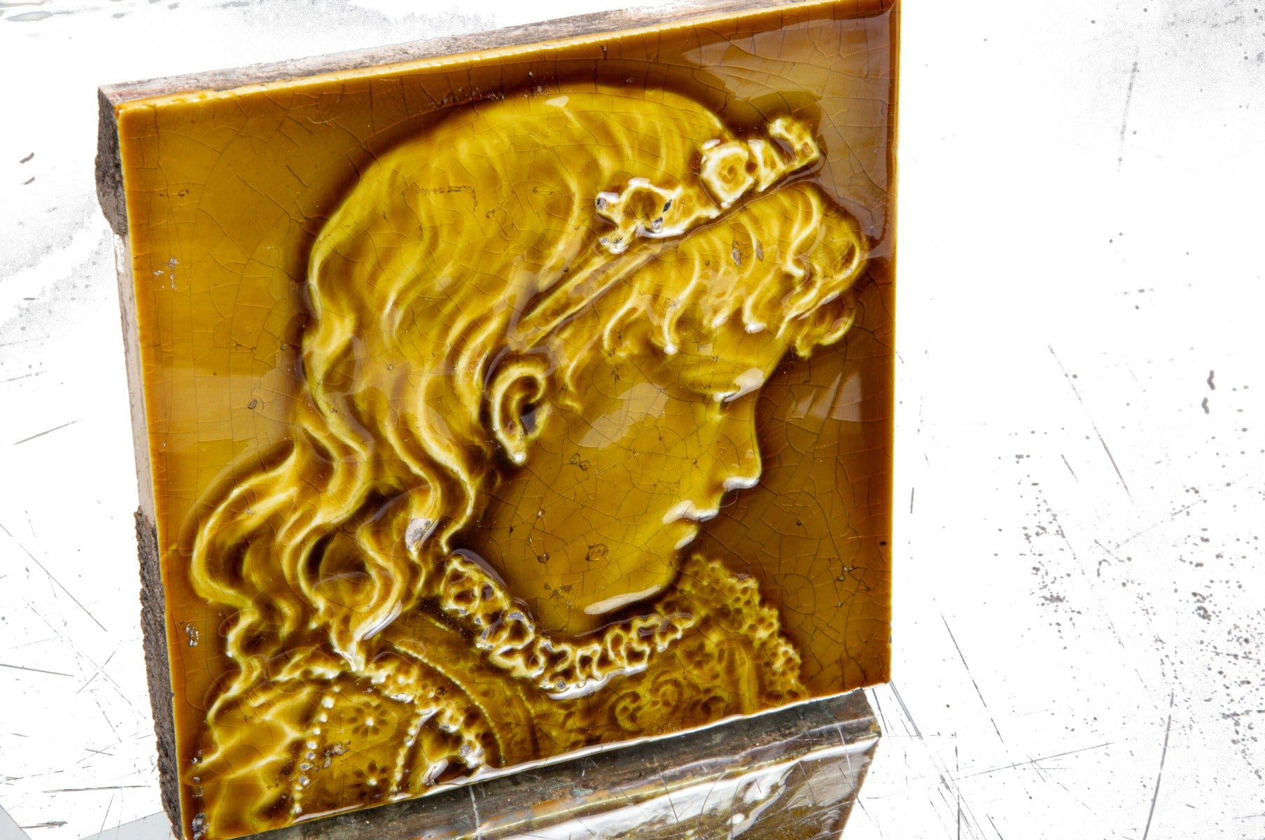 original american 19th century interior residential deeply embossed majolica glazed fireplace portrait tile with surface crazing
