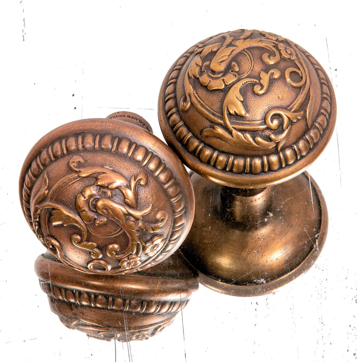 late 19th or early 20th century antique american ornament wrought brass "de bercy" pattern doorknobs by russell and erwin