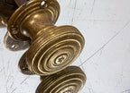 latre 19th century adams & westlake cast bronze saloon door handles with lightly incised concentric  circle