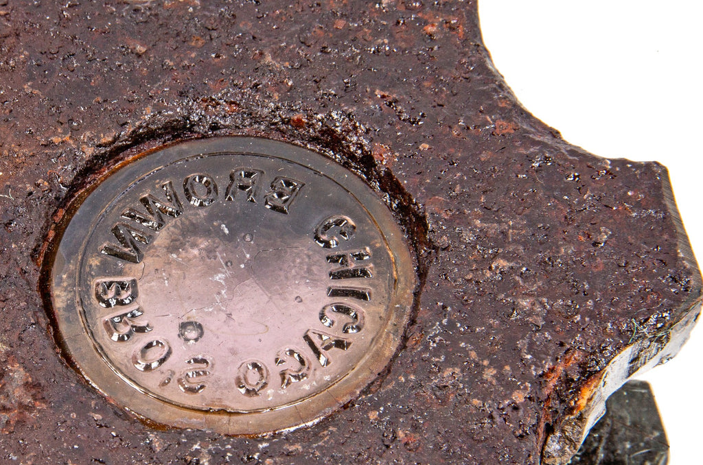 late 1870's american industrial city of chicago sidewalk cast iron vault lens panel fragment reconfigured into a paperweight or coaster