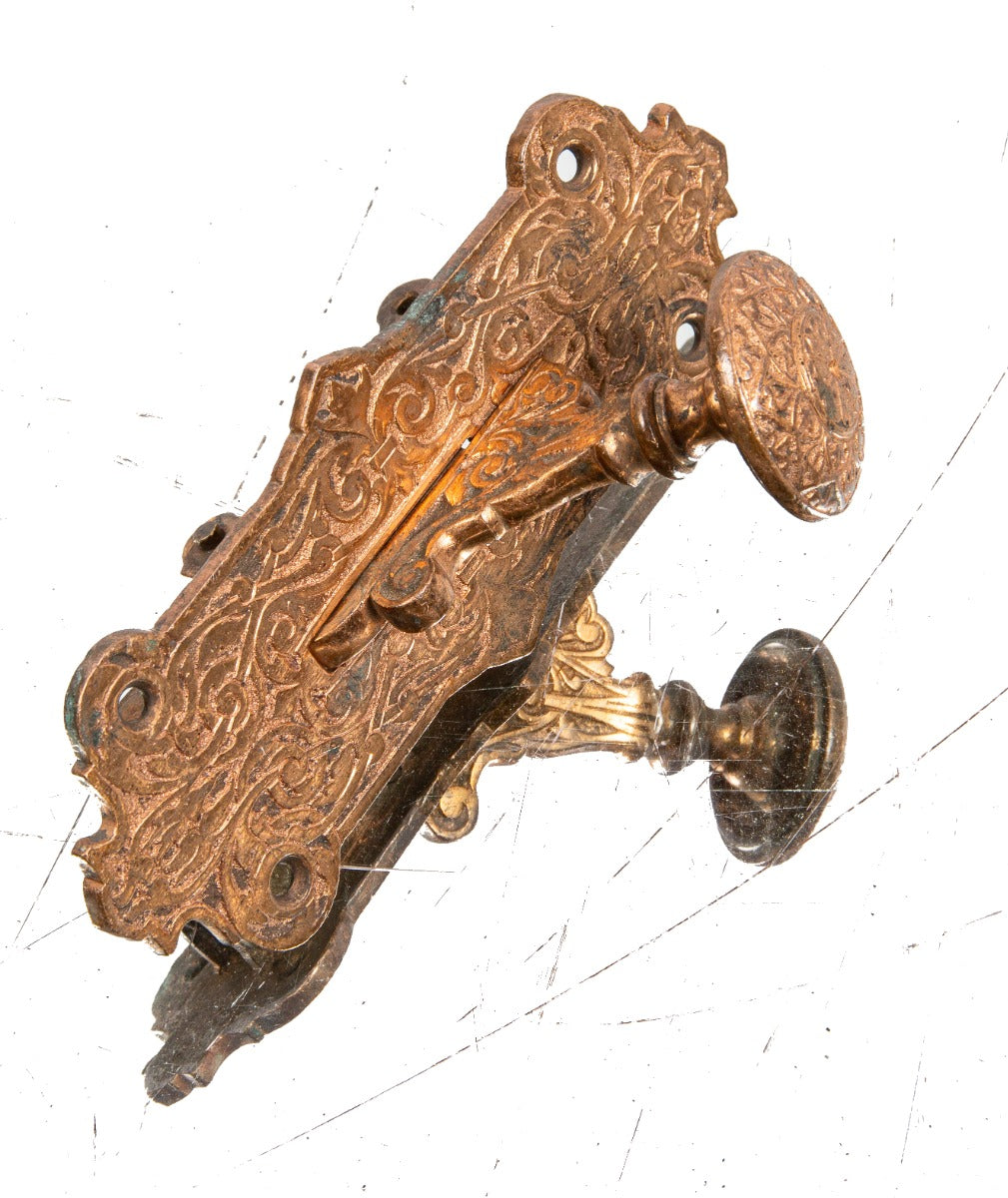 impressive 1870s ornamental cast bronze high victorian-era exterior residential doorbell pull lever with nicely aged patina