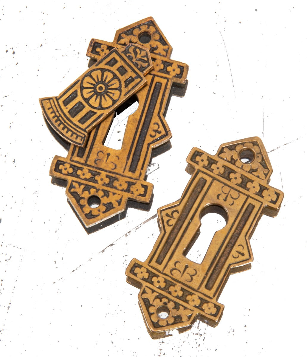 hard to find matching oversized early 1880s p.f. corbin "crisscross" pattern doorknob keyplates with intact swinging covers