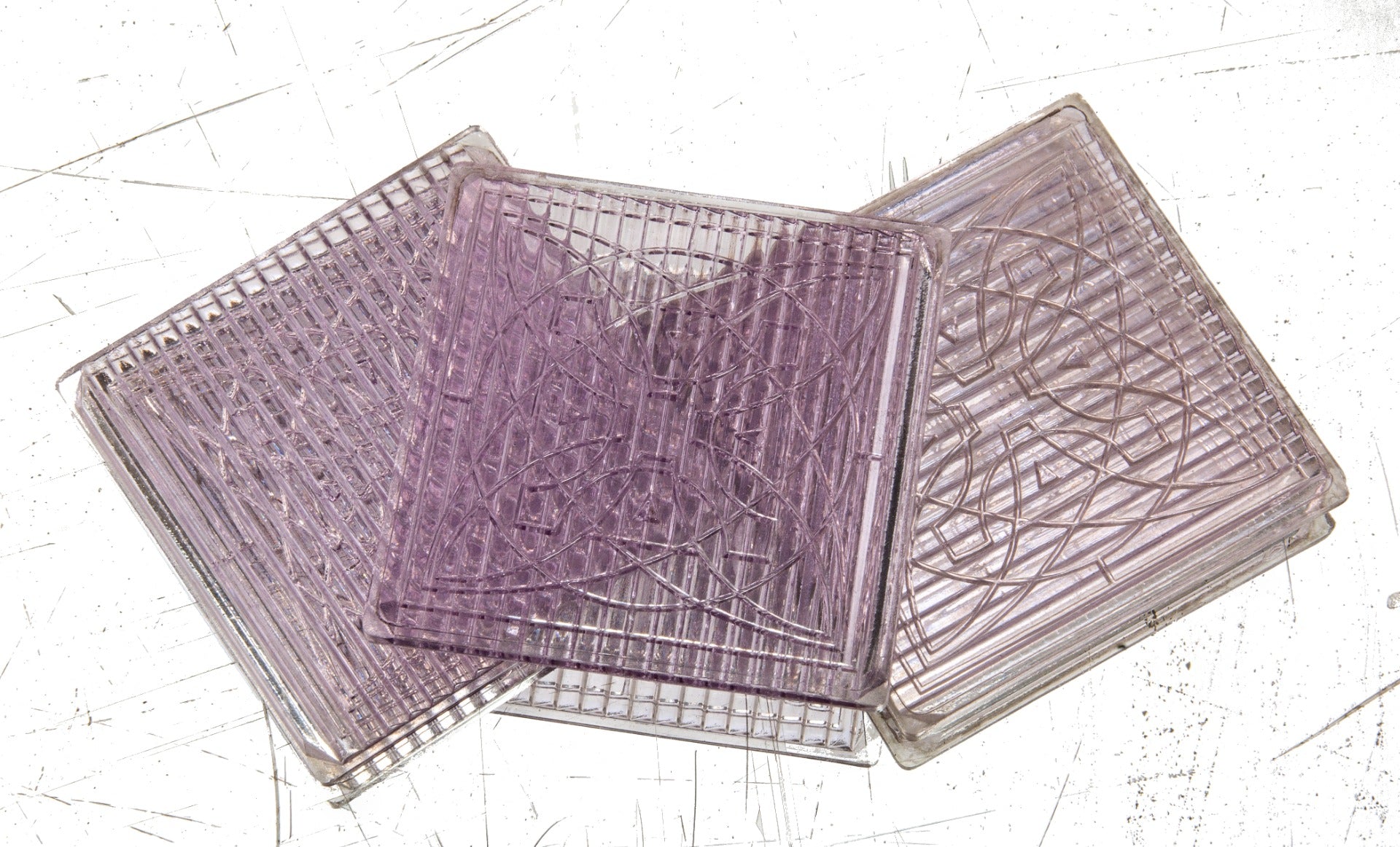 three matching early 20th century frank lloyd wright-designed sun-purple exterior building prismatic glass tiles
