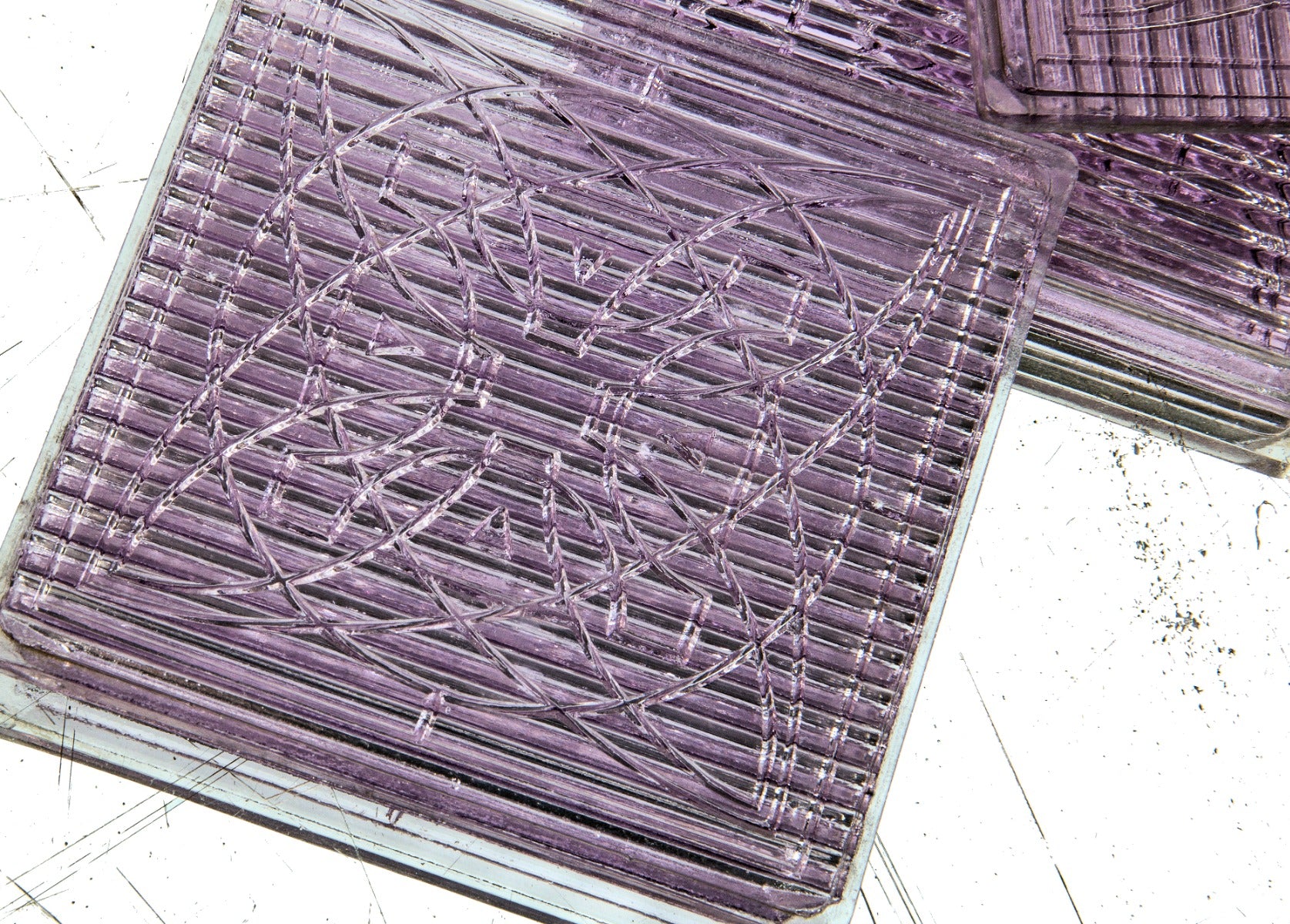 three matching early 20th century frank lloyd wright-designed sun-purple exterior building prismatic glass tiles