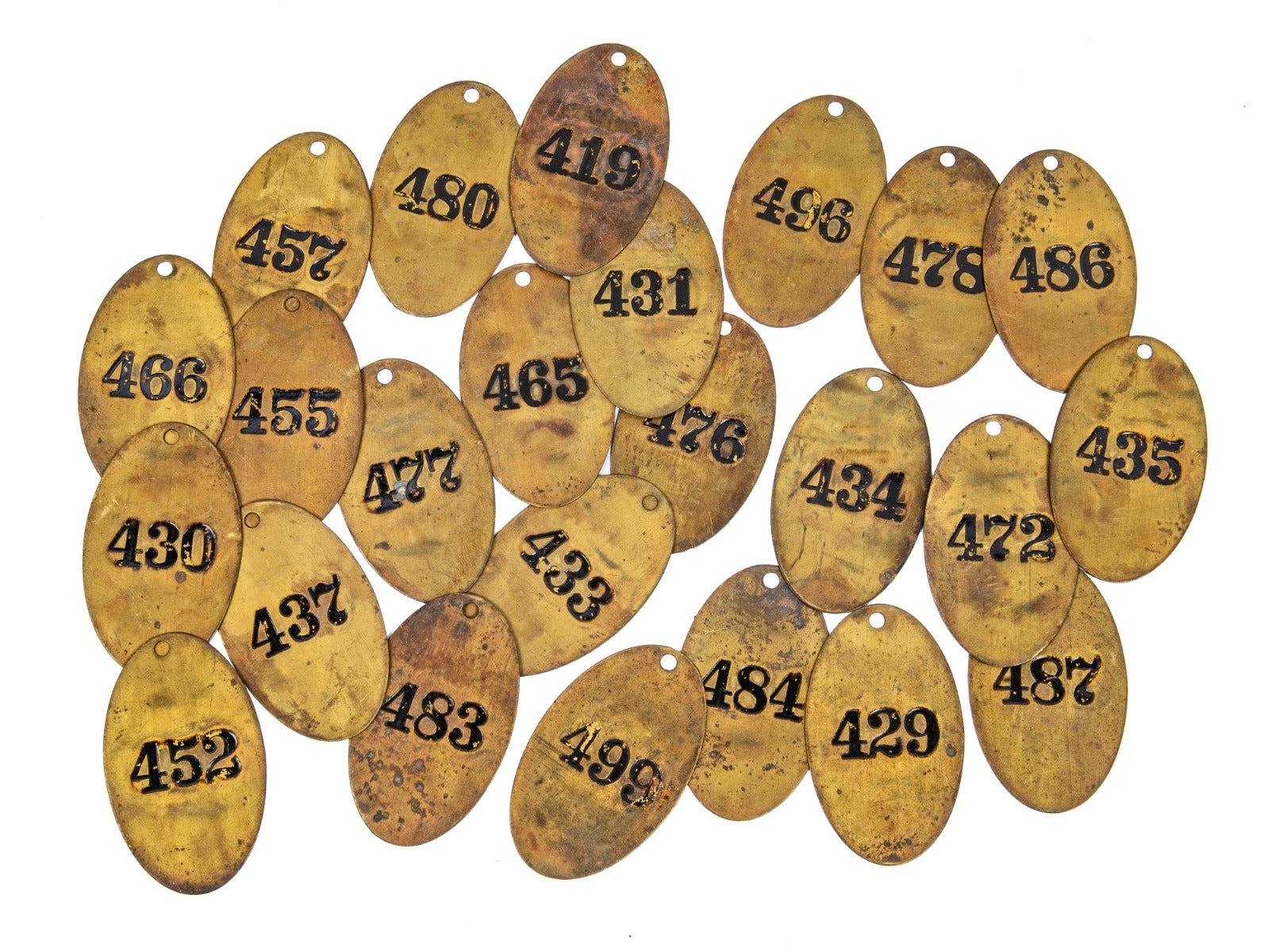 large lot of early 20th century ywca hotel heavy stamped brass guest room door key fobs with black enameled numbers