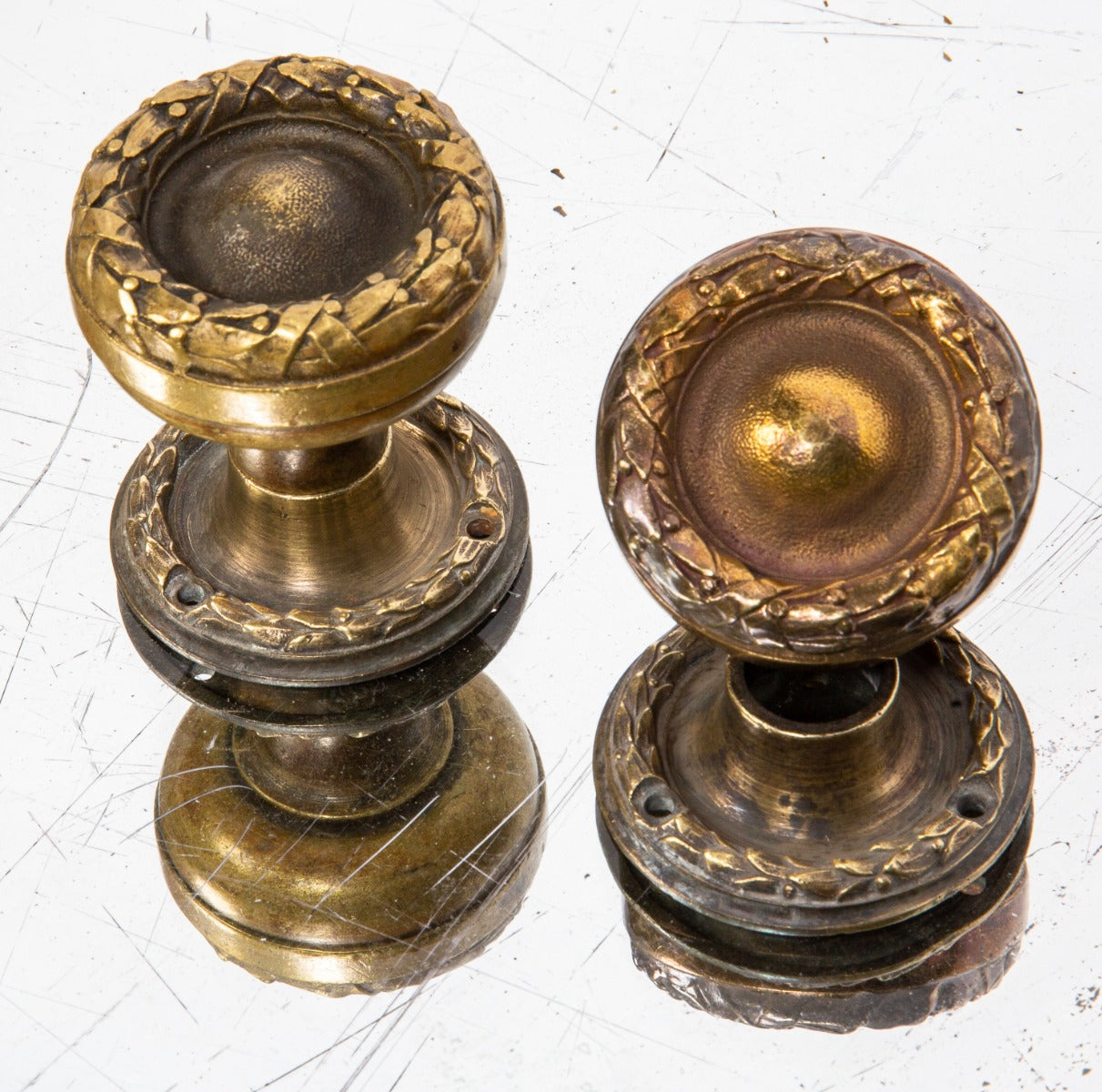 pair of holabird and roche-designed ornamental cast brass chicago city hall doorknobs with matching rosettes