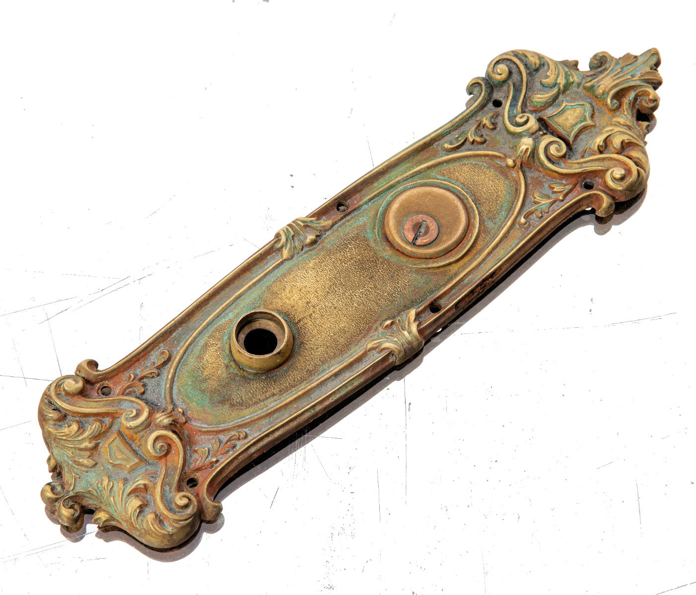oversized cast brass exterior residential entrance door backplate with nicely aged patina