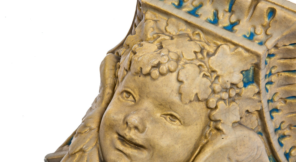 rare original early 20th century rookwood faience vellum-glazed winged cherub from la salle hotel wine room