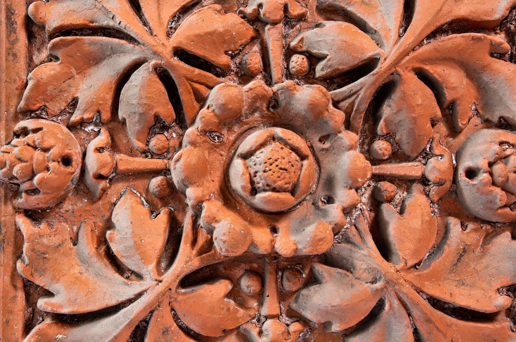 early 1880s heavily ornamented northwestern terra cotta company red slip glaze terra cotta panel