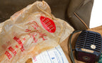 richard nickel's 1950s-1960s audio equipment carrying case with carefully labeled cables, microphones, and speaker
