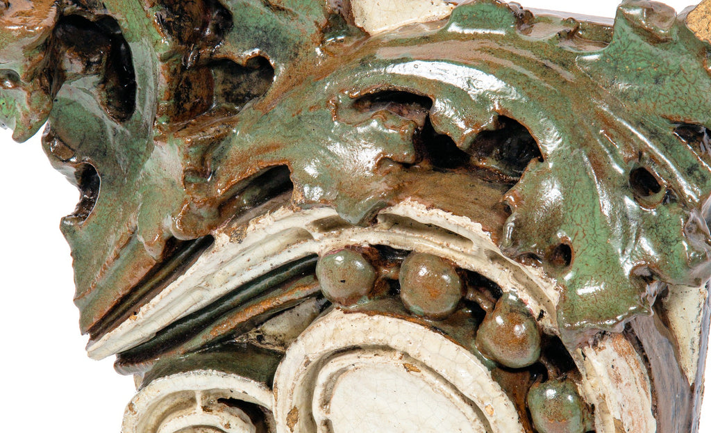 oversized two-tone early 20th century sullivanesque style chicago commerical building glazed terra cotta with deep undercuts