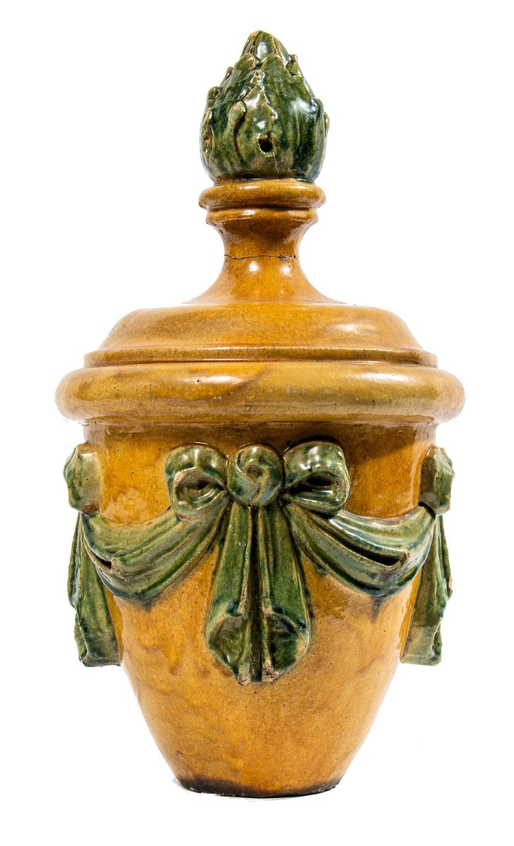 brightly colored green and yellow-glazed 1927 milwaukee venetian theater exterior roofline terra cotta finial pot