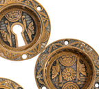 four matching 19th century eastlake style ornamental cast bronze circular-shaped salvaged chicago pocket door backplates