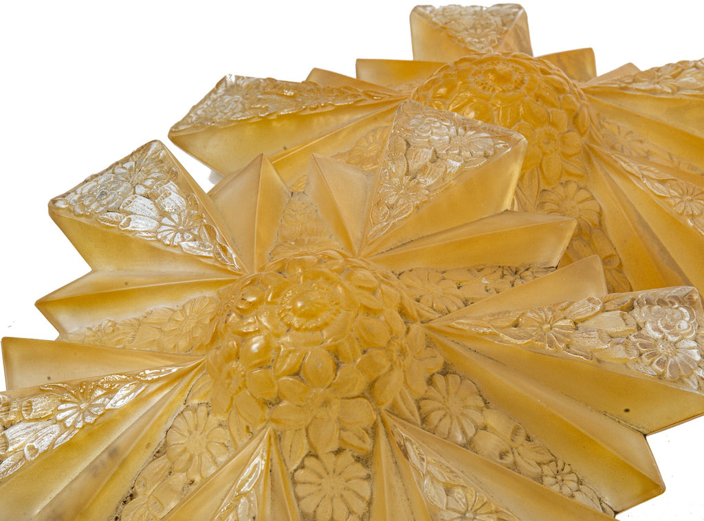 one of two matching american1930's art deco style "modernizer" pressed amber glass drop shades bearing floral motifs